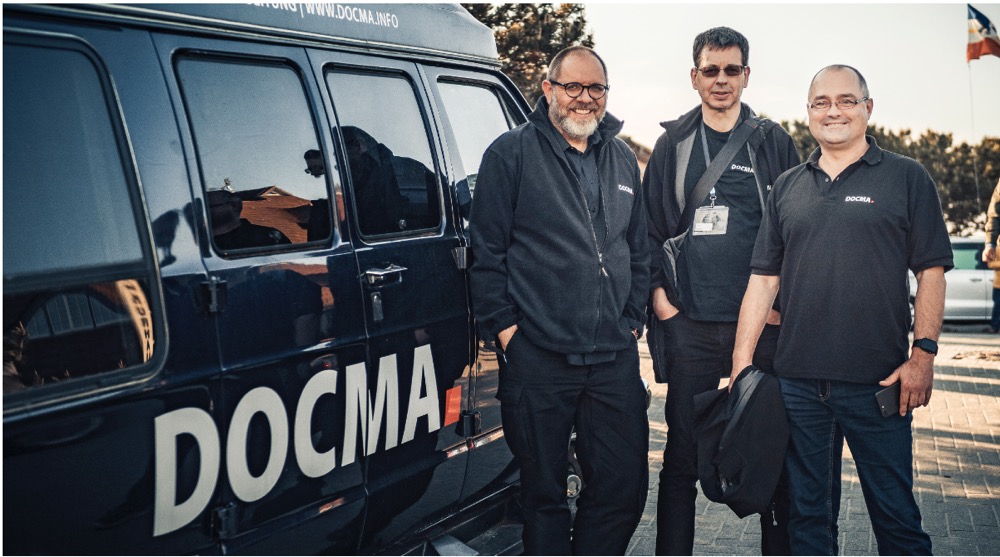 Christoph Künne, Michael J. Hußmann und Olaf Giermann mit dem DOCMA-Truck auf Festivalreise