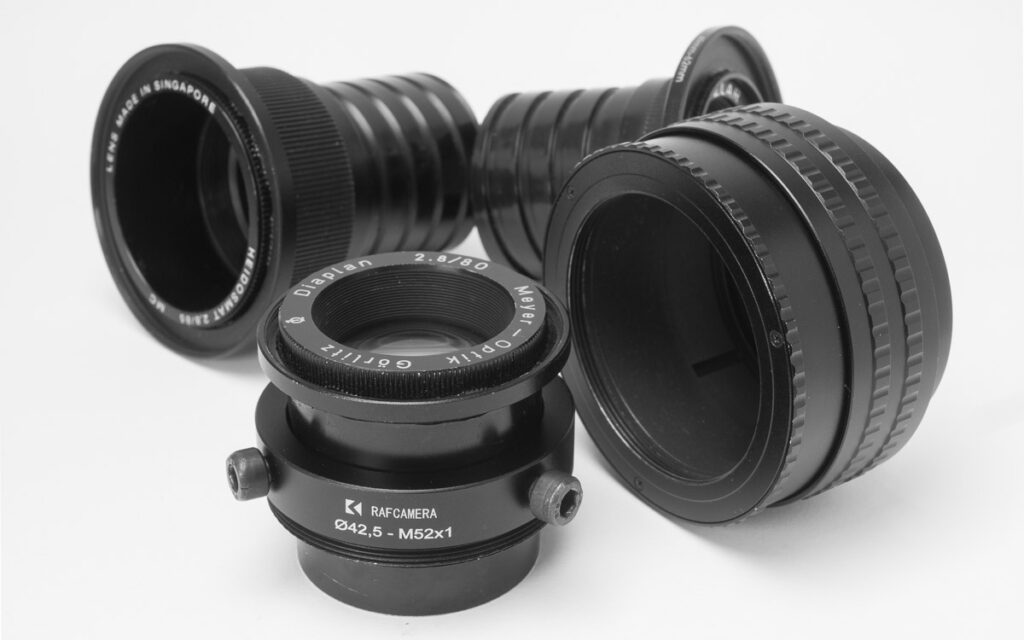 Trioplan-Projektionsobjektive. Absurd: Nikon FTZ-Adapter mit M42-Anschluss?